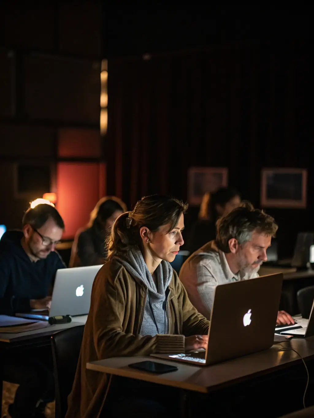 A focused image of a digital literacy workshop, with participants learning computer skills and navigating online resources, held in the digital space at ASSOCIATION MULTICULTURELLE CRITEUILLOISE.